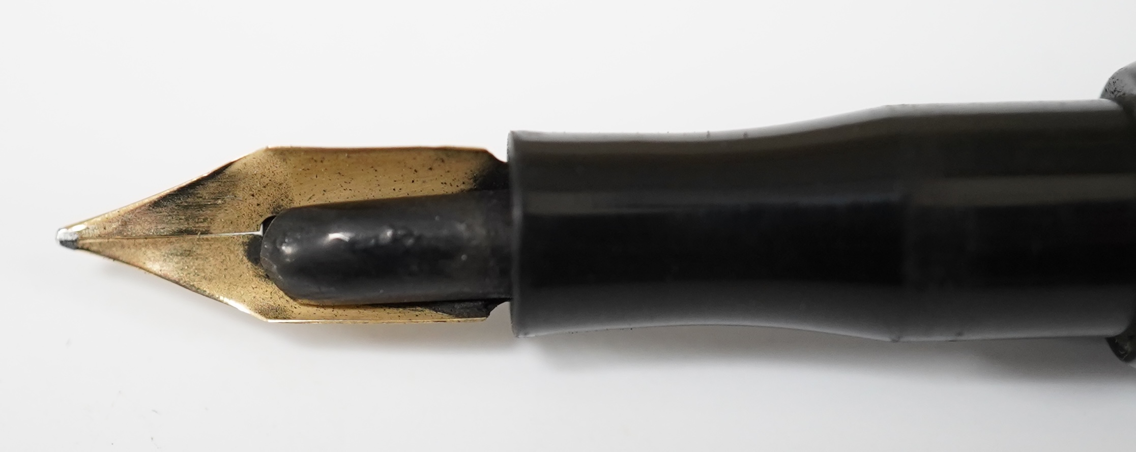 A high relief gold filled Eyedropper, with over and under feed and 14ct. gold nib